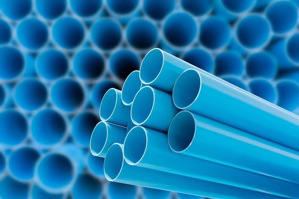 blue-pvc-pipes-water-stack-warehouse_176124-492-transformed