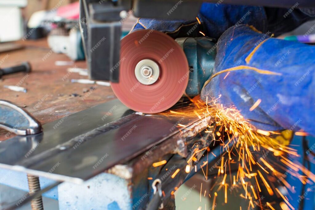 metal-grinding-steel-plate-with-flash-sparks-close-up_478515-6881